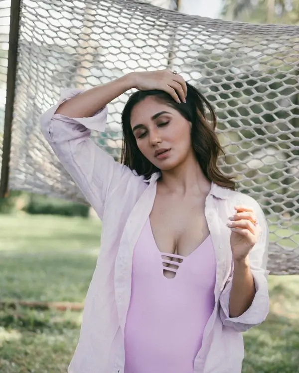 Hot Nikita Dutta Showcased Her Big Boobs and Curvy Figure in Purple Monokini With a Breezy Shirt (3)