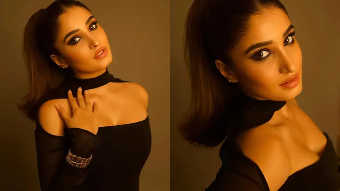 Hot Rasha Thadani Showcased Her Big Boobs and Curvy Figure in a Chic Black Turtle Halter Neck Outfit (1)