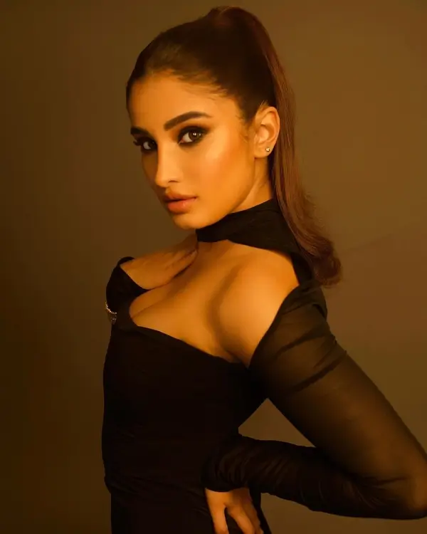 Hot Rasha Thadani Showcased Her Big Boobs and Curvy Figure in a Chic Black Turtle Halter Neck Outfit (2)