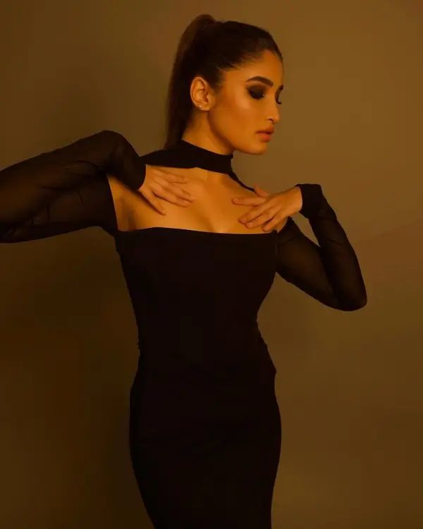 Hot Rasha Thadani Showcased Her Big Boobs and Curvy Figure in a Chic Black Turtle Halter Neck Outfit (3)