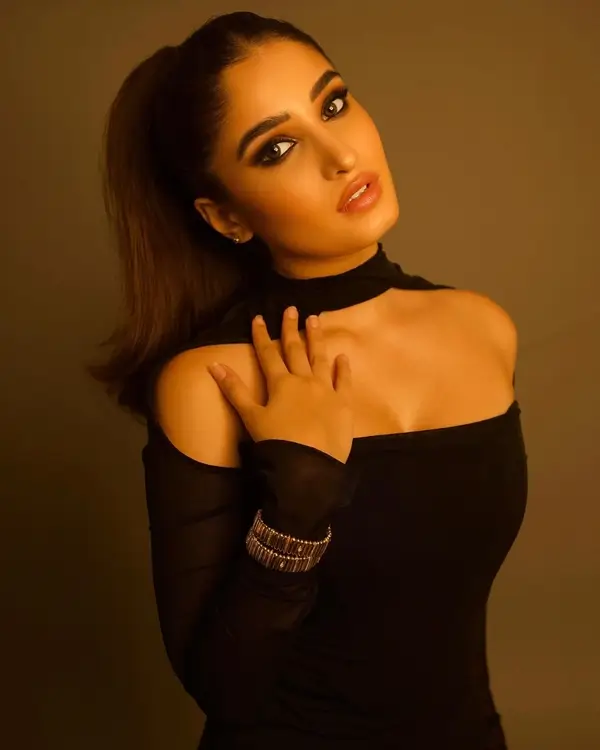 Hot Rasha Thadani Showcased Her Big Boobs and Curvy Figure in a Chic Black Turtle Halter Neck Outfit (6)