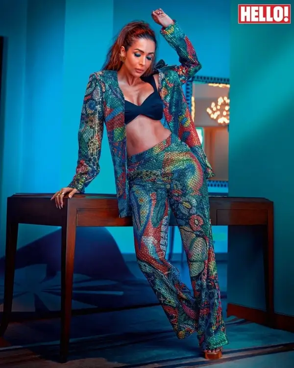 Hot Malaika Arora Shows Off Big Boobs and Deep Cleavage in Bold Blue Bralette Paired With Vibrant Multi colored Pants (2)