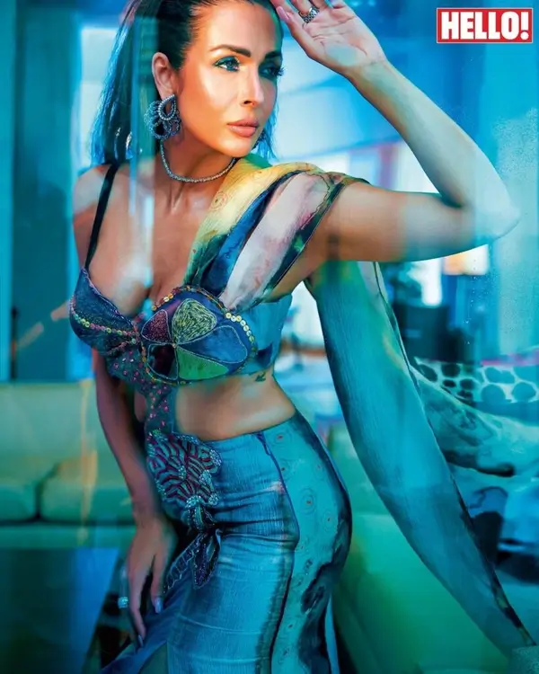 Hot Malaika Arora Shows Off Big Boobs and Deep Cleavage in Bold Blue Bralette Paired With Vibrant Multi colored Pants (4)