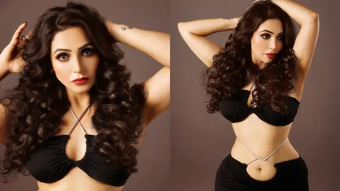 Hot Nandini Rai Showcased Her Big Boobs and Curvy Body in a Figure hugging Black Dress (1)