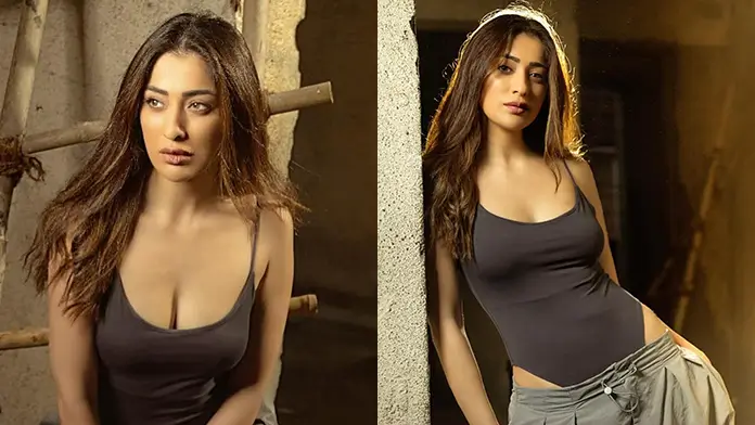 Hot Raai Laxmi Showcased Her Big Boobs and Curvy Figure in a Chic Black Monokini (1)