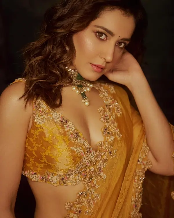 Hot Raashii Khanna Flaunts Her Big Boobs in a Golden orange Lehenga Set (2)