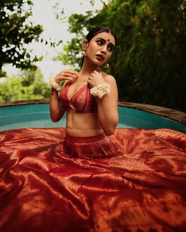 Hot Priya Prakash Shows Off Big Boobs and Deep Cleavage in a Gorgeous Red Silk Lehenga Paired With a Bralette (3)