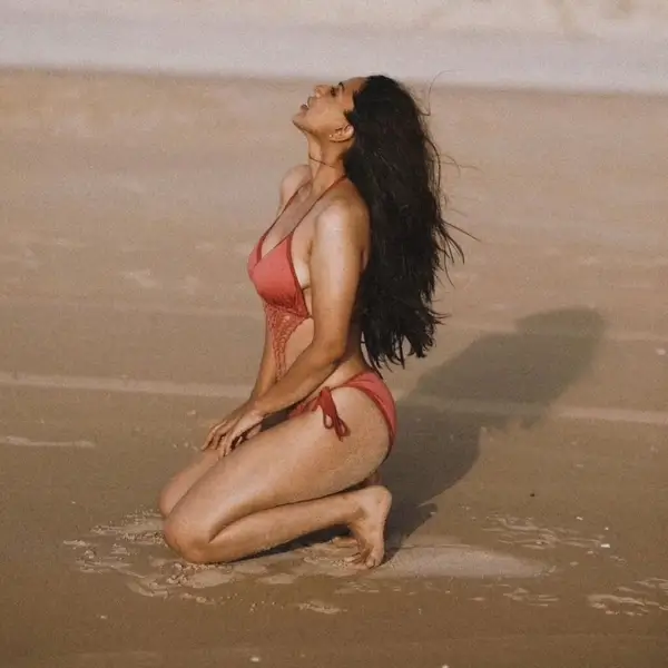 Hot Deviyani Sharma Showcased Her Big Boobs and Curvy Figure in Orange Monokini (2)