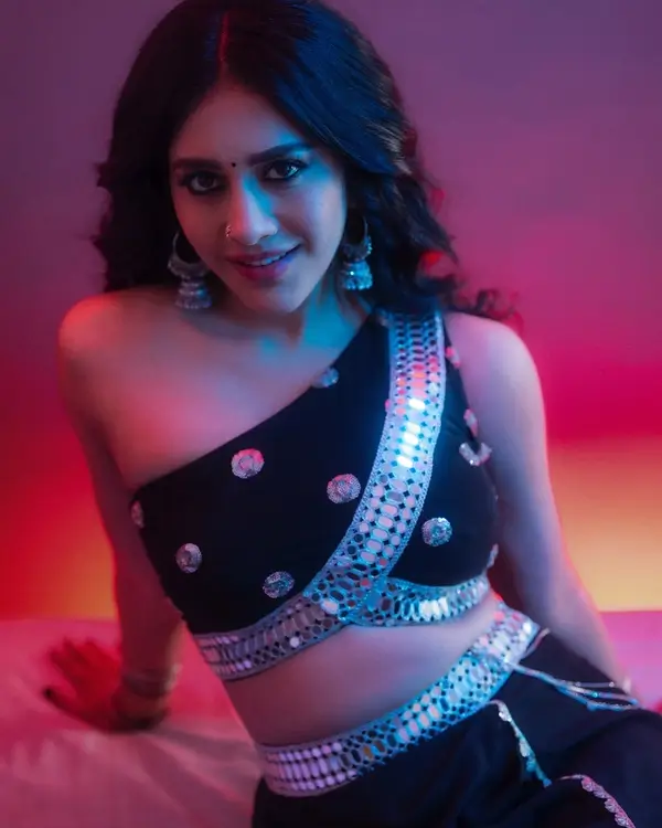 Hot Nabha Natesh Flaunts Her Big Boobs in Black One shoulder Shirt and a Skirt (4)