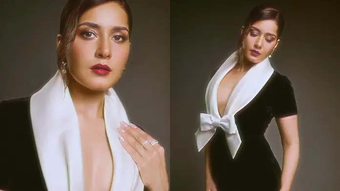 Hot Raashi Khanna Shows Off Big Boobs and Deep Cleavage in a Black Dress (1)