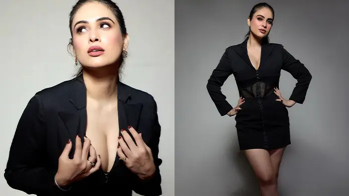 Hot Neha Malik Shows Off Big Boobs and Deep Cleavage in Black Dress (1)